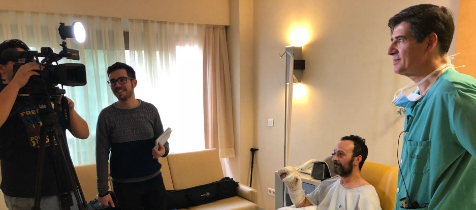 Dr Piñal and one of his patients with a team of reporters from LA SEXTA